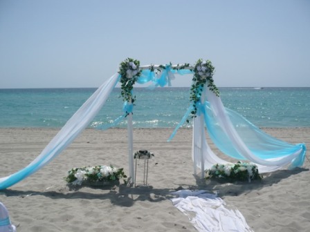 Beach Wedding But Fabric on Arch blows away really bad Any ideas