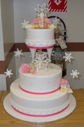 pink and white snowflake wedding cake snowflake wedding cake 