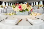 Wedding Table Flowers. Are you planning your wedding? Have you thought about the flowers and decorations for the head tables and guest tables? Get ideas today!
