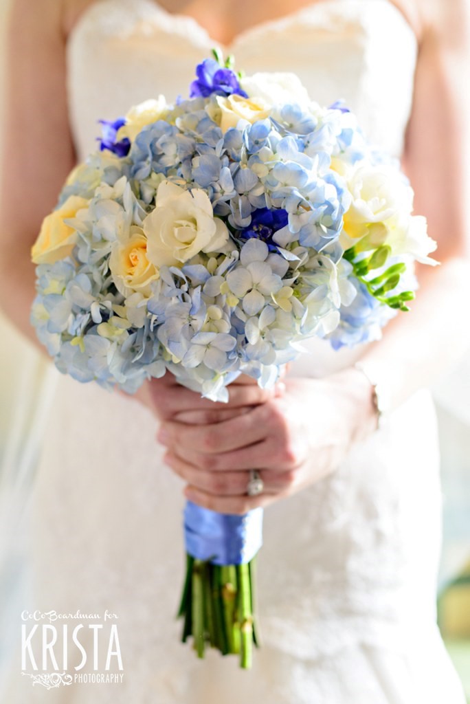 Bride With a Beautiful Blue, White and Yellow Wedding Bouquet