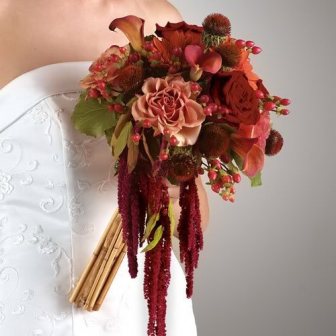 bride holding beautiful brown wedding bouquet