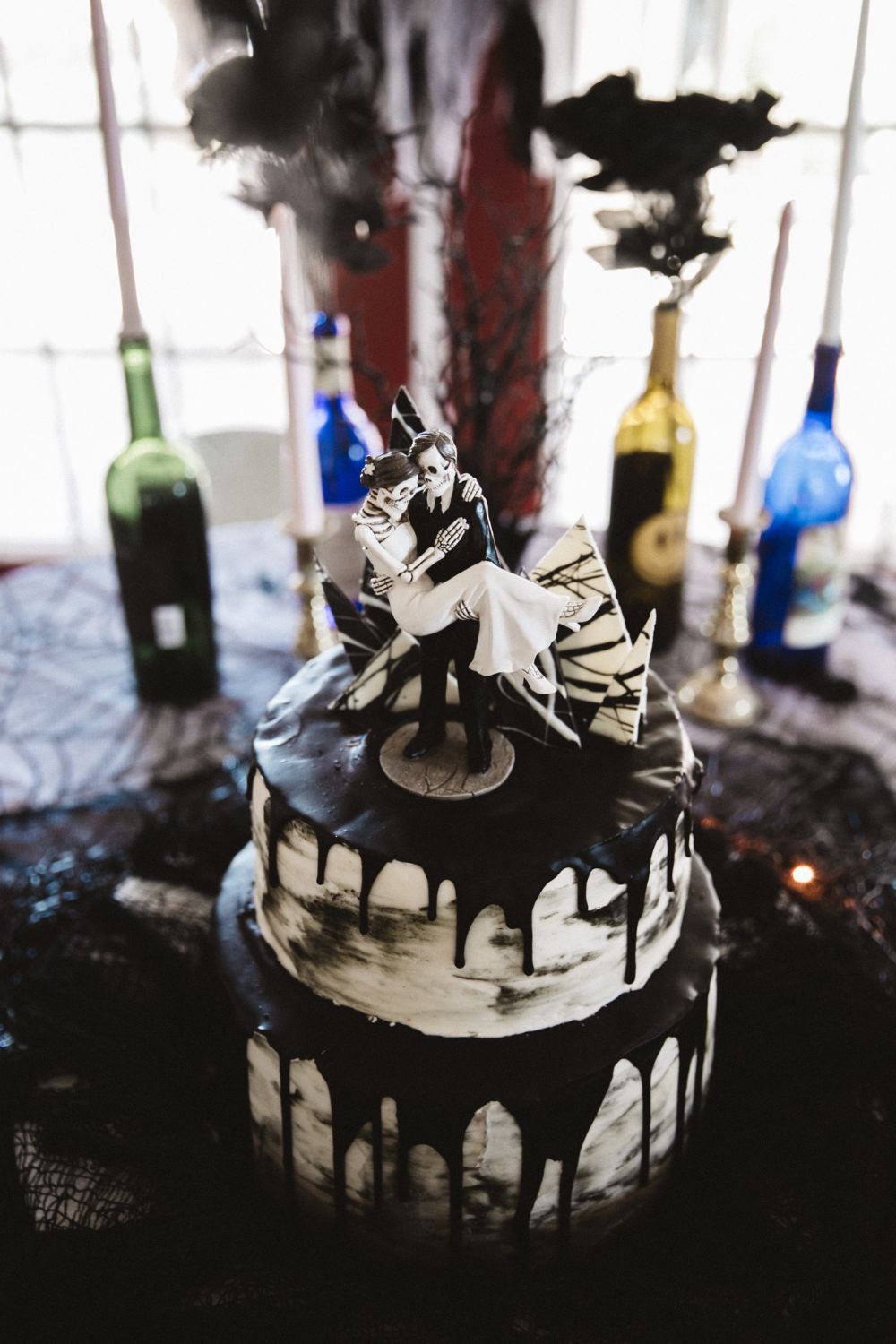 Black and White Dripping Cake With Corpse Couple