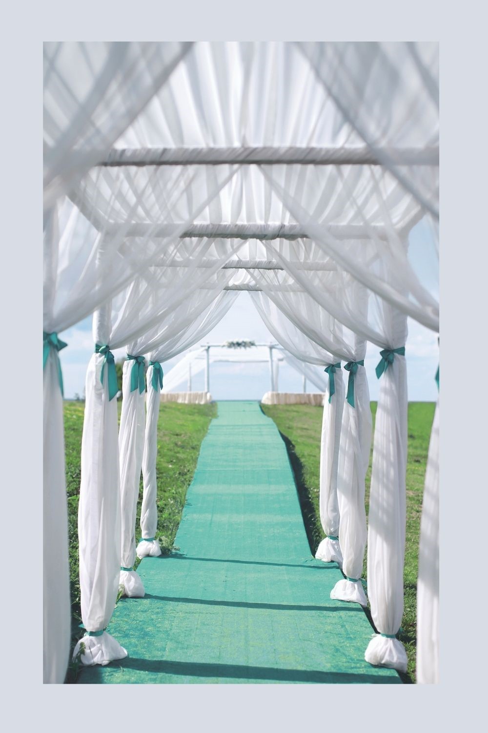 Series of White bridal arches with a touch of green and a green wedding aisle