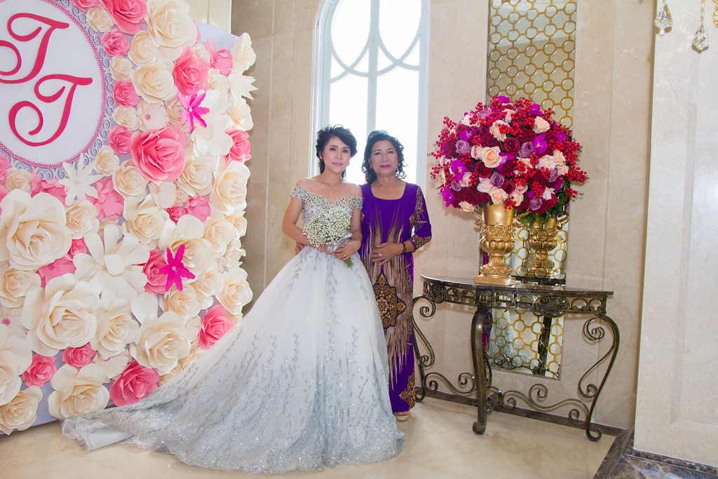 Gorgeous Pink, Yellow and Purple Wedding Centerpiece and Floral Backdrop