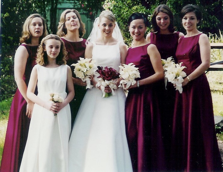 Wedding Party With Contrasting Bouquets - Bridesmaids in Purple dresses with white bouquets, bride in White with purple bouquet