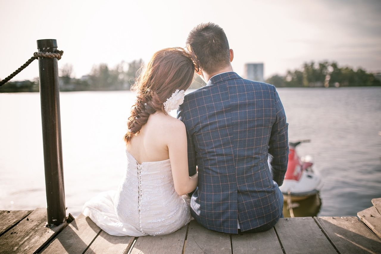 Bride and Groom Sitting on Dock, casual wedding ideas