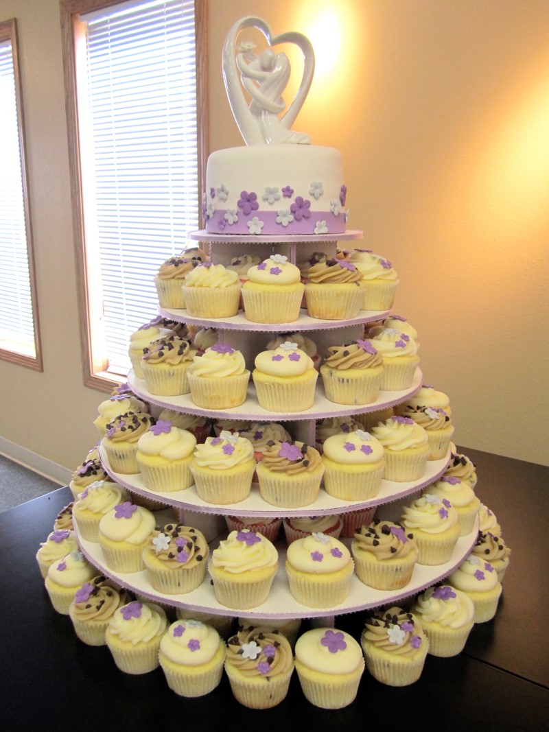 cup cake wedding cakes, wedding cupcakes, cupcake wedding cakes, yellow and purple cupcakes, purple and yellow wedding cupcakes