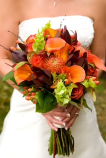 Bride Holding Beautiful Fall Themed Wedding Bouquet