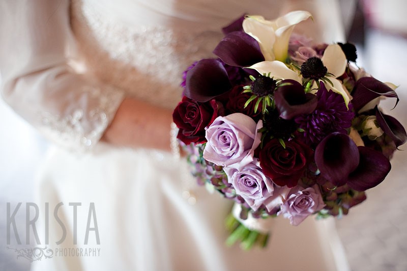 Bride Holding Purple Wedding Bouquet