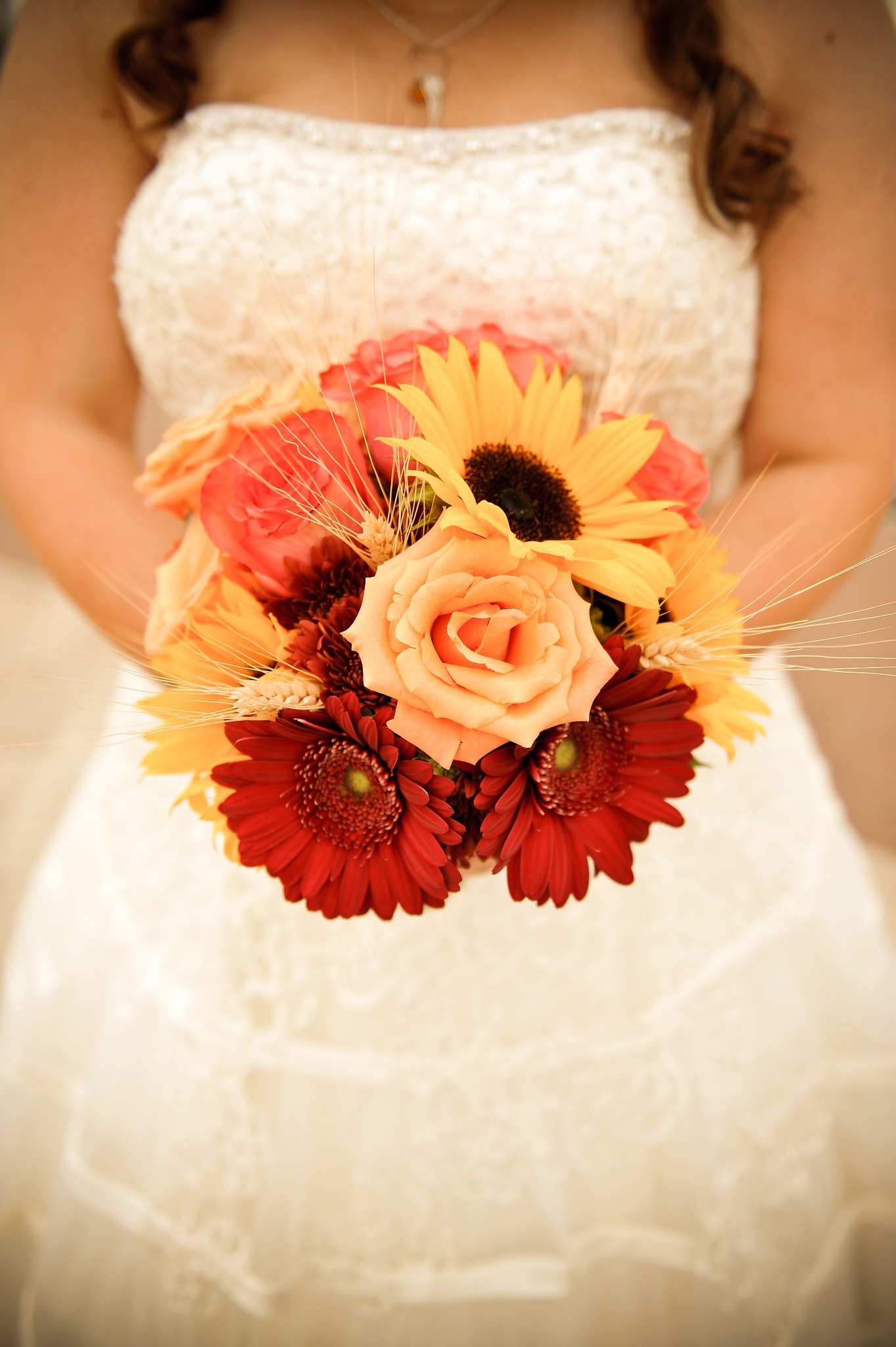 Bride Holding Beautiful Red and White Wedding Bouquet