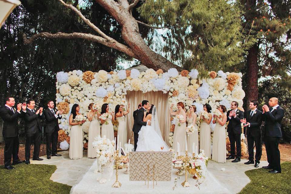 Gorgeous Outdoor Wedding with an abundance of cream, White and Brown Flowers.