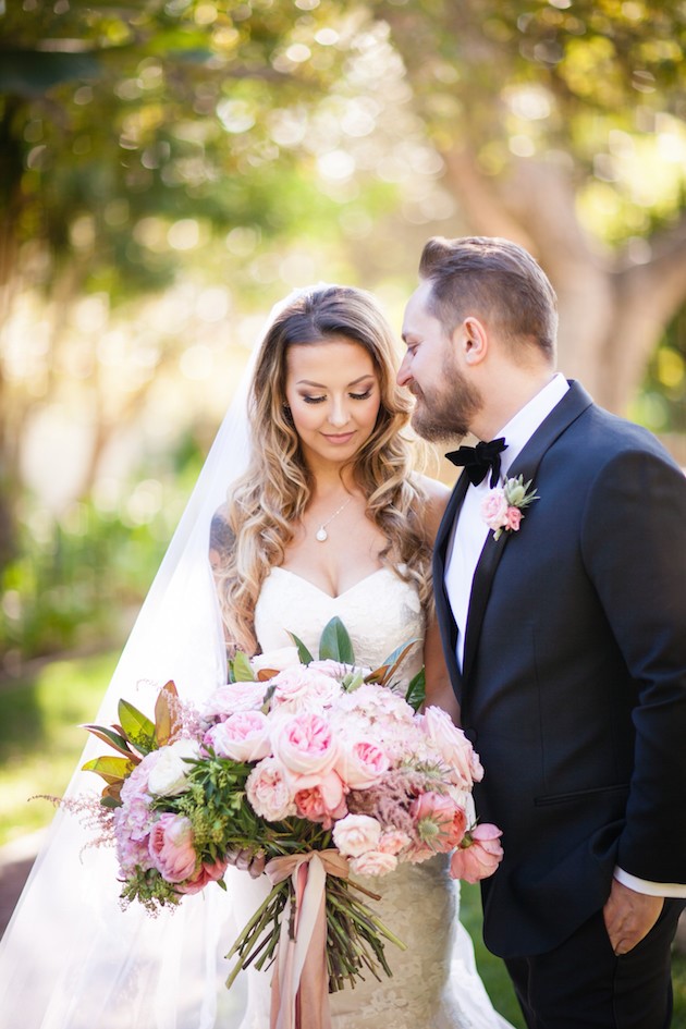 Photo of bride and groom, Bride carrying beautiful Pale Pink Wedding Bouquet