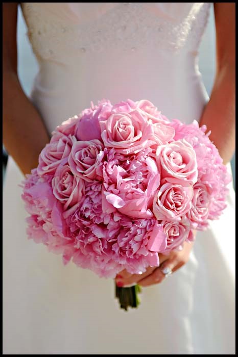 Bride With Stunning Pink Wedding Bouquet of Peony and Roses