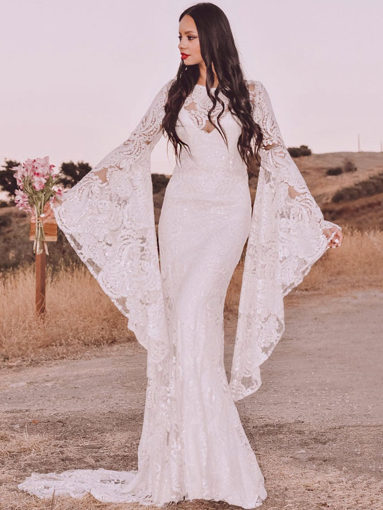 Lace Bohemian Wedding Gown With Flowing Sleeves and a Court Train