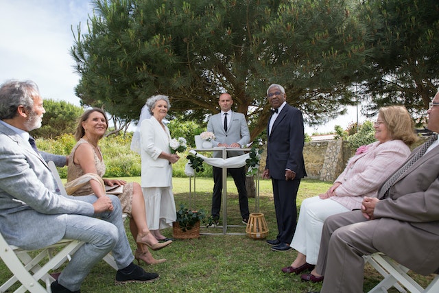Outdoor Wedding of Older Mixed-Race Couple