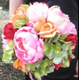 Colorful pink, green, red and orange wedding bouquet