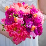 Bride Holding Stunning Pink, Purple, Orange and Green Wedding Bouquet