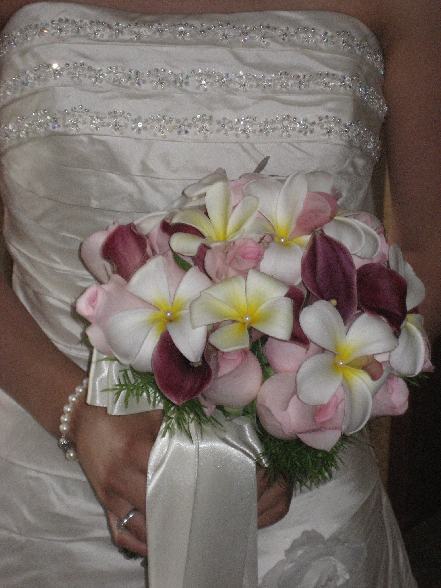 Bride Holding Beautiful White, Pink and Burgundy Wedding Bouquet With Jewels