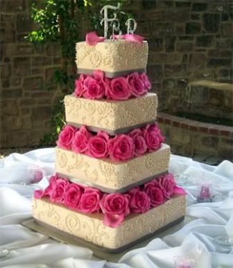 wedding cakes with fresh flowers, yellow wedding cake, yellow and pink wedding cake