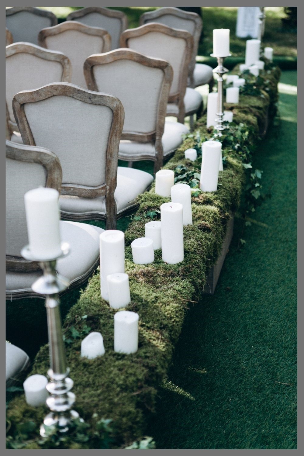 outdoor wedding ceremony decorated with white candles