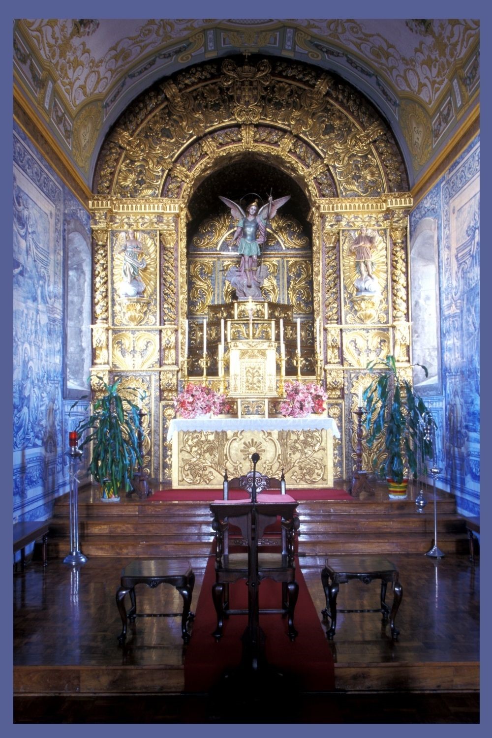 Ornate and beautiful gold and pink decorated wedding altar