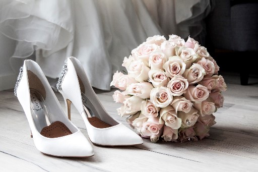 wedding shoes and bouquet photo