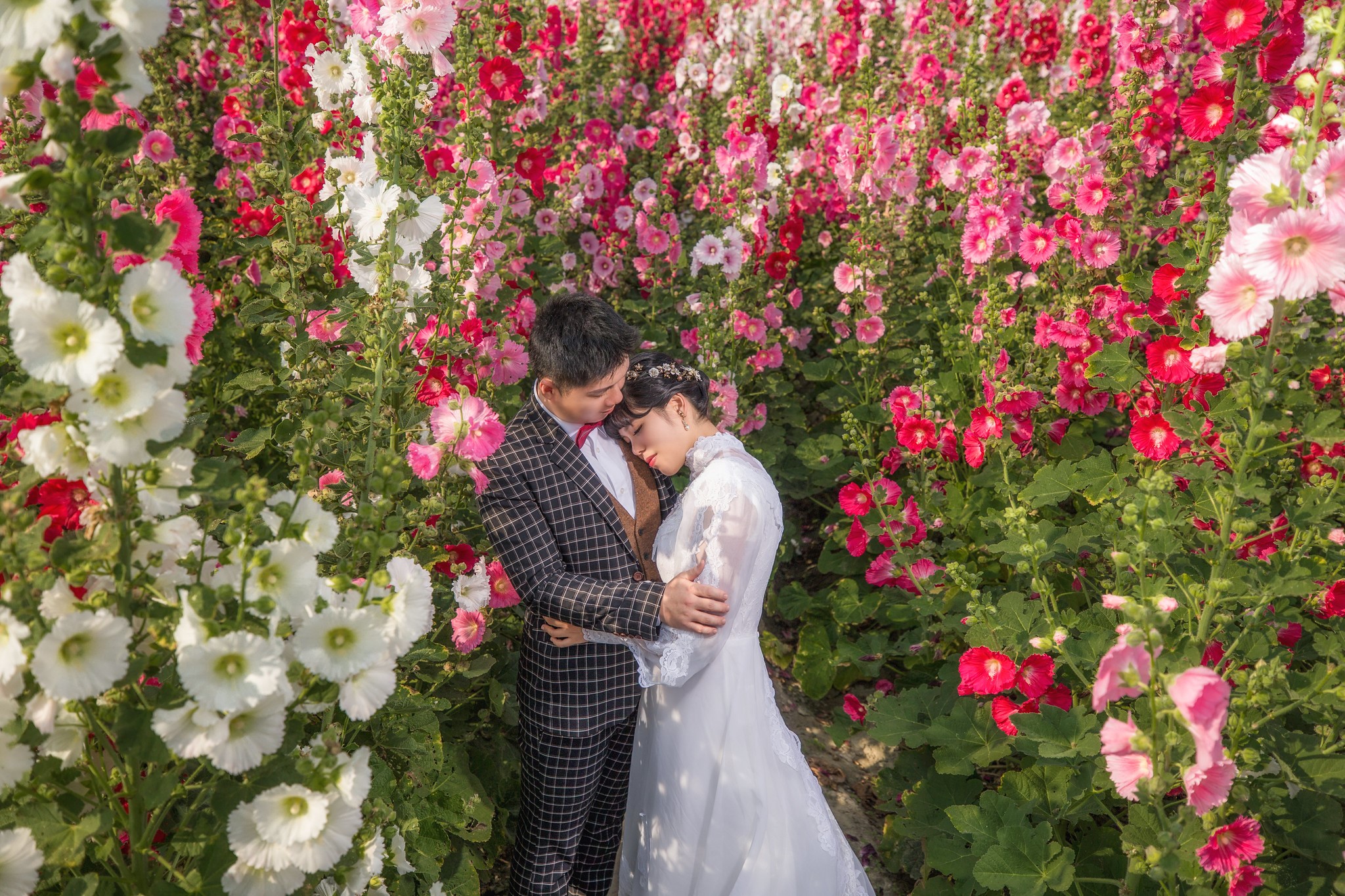 Bride and Groom in 8 Feet Tall Floral Garden