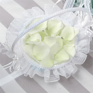 flower girl white flower basket and pale yellow petals