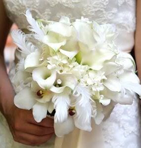 Bride with beautiful white wedding bouquet