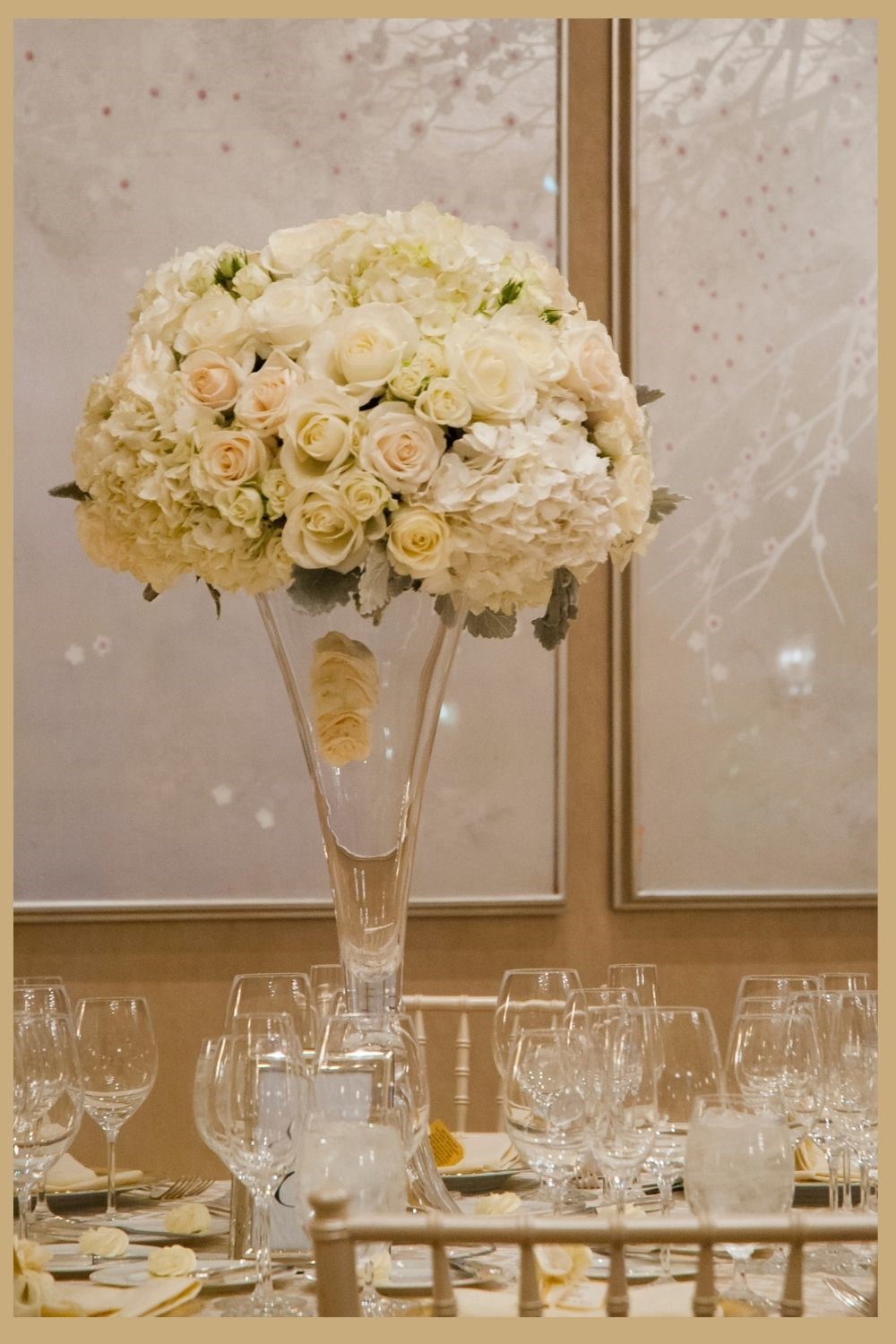 Gorgeous White Wedding Flowers in a Tall Wedding Centerpiece
