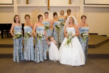winter wonderland wedding ideas, white and blue wedding scheme, bride with bridesmaids in baby blue